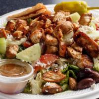 Grilled Chicken Salad · Grilled marinated chicken atop fresh garden greens. W/tomatoes, red onions, cucumber, feta c...