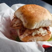 Mesquite Turkey Burger · SLICED mesquite turkey, lettuce, tomato, red onion, and homemade tzatziki sauce on a toasted...