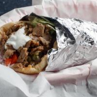 Lamb Gyro · Chopped gyro meat(lamb & beef). Dressed with lettuce, tomato, red onion, and homemade tzatzi...