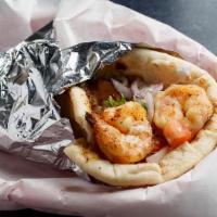 Grilled Shrimp Gyro · Grilled, jumbo shrimp. Dressed with lettuce, tomato, red onion, and homemade tzatziki sauce ...