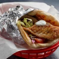 Grilled Tilapia Gyro · Seasoned fresh tilapia. Dressed with lettuce, tomato, red onion, and homemade tzatziki sauce...