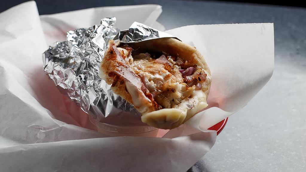 Jc Specialty Gyro · Grilled chicken, gyro meat(lamb&beef), melted mozzarella and feta cheese, grilled red onion, tomato, and homemade tzatziki sauce in a pita wrap.