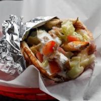 Veggie Delight Specialty Gyro · Lettuce, cucumber, tomato, grilled red onions, melted mozzarella and feta cheese, and homema...