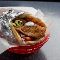 Grilled Tilapia Specialty Gyro · Seasoned fresh tilapia. Dressed with melted mozzarella and feta cheese, grilled red onion, t...