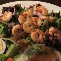 Grilled Shrimp Salad · Fresh mixed greens topped with grilled shrimp, onions, cherry tomatoes, black olives, and ch...