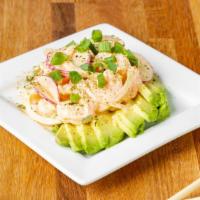 Shrimp-Avocado Salad · Gulf shrimp tossed in a sriracha aioli with sweet onions and radishes in an avocado half, to...