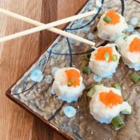 Shrimp Shumai · Five or 10 steamed shrimp dumplings with orange masago and sweet chili sauce