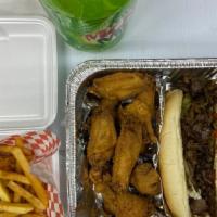 #8 2 Philly Cajun Turkey & 10 Wings · 2 Philly Cajun Turkey and 10 Wings served with Family size French Fries & 2 Liter soda
Phill...