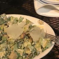 Caesar Salad · Romaine lettuce, croutons, Parmesan cheese, and classic caesar dressing.