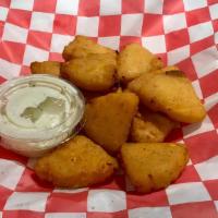 Mac 'N Cheese Bites · Creamy mac and cheese fried. Served with ranch.