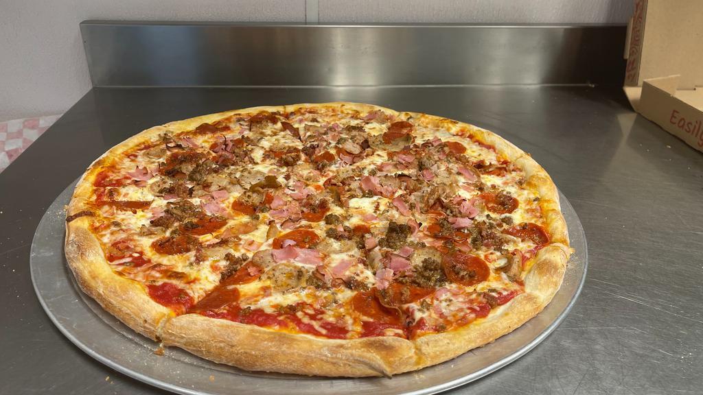 Meat Lover Pizza · Mozzarella, pepperoni, sausage, ground beef, bacon and ham.
