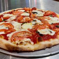 Margherita - An Italian Classic Pizza · Mozzarella, Roma tomato, fresh basil and extra virgin olive oil.