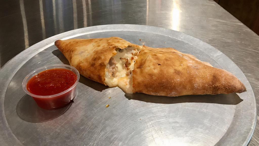 Create Your Own Calzone · Mozzarella and ricotta and 1 topping.