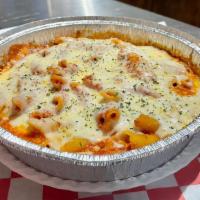 Baked Ziti · Penne pasta tossed in ricotta, Romano and homemade marinara, then baked with mozzarella chee...
