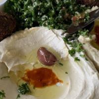 Phoenicia Appetizers · Sample of hummus, baba ganoush, labneh, kibbeh, falafel, tabbouleh and grape leaves.