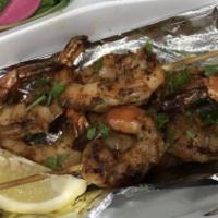 Shrimp Kabob · Grilled jumbo shrimp marinated in olive oil, herbs and spices.