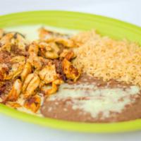Chori Pollo · Grilled chicken and chorizo topped with cheese dip. Served with rice, beans and tortillas.