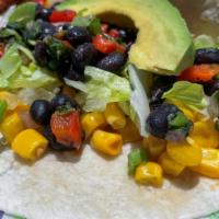 Veggie Taco · Lettuce, white rice vegetable medley, black bean salsa, corn, fresh lime pico de gallo, and ...