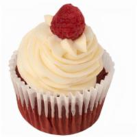 Red Velvet · Rich Red Velvet cake, topped with creamy cream cheese frosting, finished with a fresh raspbe...