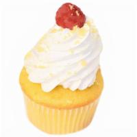 Lemon Raspberry Burst · Lemon cake filled with a raspberry puree, topped with a vanilla whipped icing and finished w...