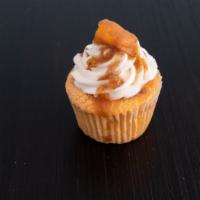 Peach Cobbler · Peach Cake filled with Peach Cobbler, Vanilla Frosting and topped with a peach and cobbler d...