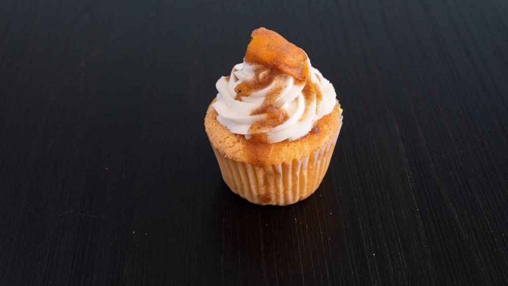 Peach Cobbler · Peach Cake filled with Peach Cobbler, Vanilla Frosting and topped with a peach and cobbler drizzle