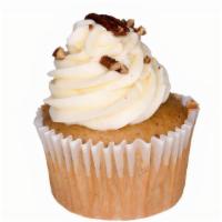 Butter Pecan · Butter pecan cake baked with pecan bits, topped with creamy cream cheese frosting, finished ...