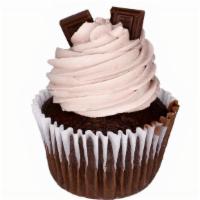 So So Chocolate · Chocolate cupcake frosted with chocolate mousse and topped with two chocolate Hersey candies...