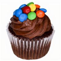 Chocolate M &M · Chocolate cupcake, frosted with chocolate buttercream frosting and topped with chocolate M &...