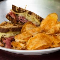 The Baron’S Classic Reuben · Pastrami and swiss cheese, sauerkraut with choice of Thousand island, or hot mustard, served...
