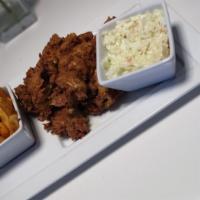Chicken Tender Plate · Hand breaded chicken tenders with French fries and cole slaw.
