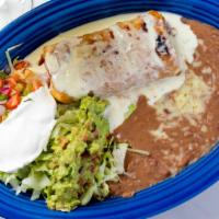 Chimichanga · Soft or fried. Our signature large flour tortilla packet filled with chicken, beef, or beef ...