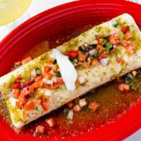 Burrito Verde (Green Burrito) · A large flour tortilla filled with a blend of beef stew and refried beans, topped with chees...