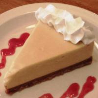 Key Lime Pie · Raspberry sauce and whipped cream