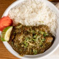 Lamb Saagwala · Overnight yogurt and spices marinated lamb, cooked in spinach sauce with mild Indian spices.