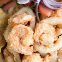 Tostadas De Camarón / Shrimp Tostadas · Tostada de ceviche (camarón, pescado y vegetales). / Ceviche with shrimp and fish in a crisp...