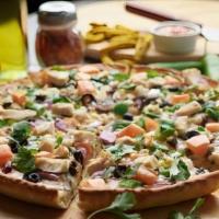 Vegan Garlic Chicken Pizza · made with our signature creamy garlic sauce, vegan cheese, vegan chicken, fresh mushrooms, c...