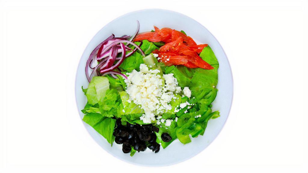 Greek Salad · Crumbled feta, black olives, tomatoes, red onions, green peppers tossed over crisp lettuce