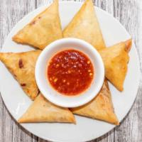 Sambusa (3) · Delicious crispy pastry filled with onion, jalapeño, cilantro, and fresh spices. With choice...