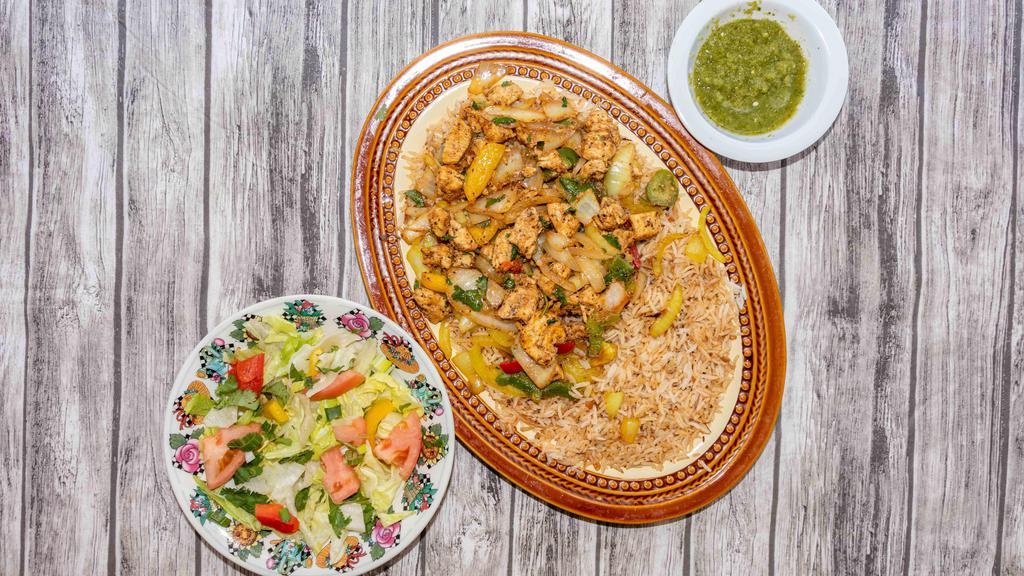 Chicken Suqaar · Made with basmati rice, chicken pieces, sautéed with herb spices and vegetables.