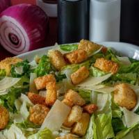 Caesar Salad · Romaine lettuce, parmesan cheese, croutons, tossed in our Caesar dressing.