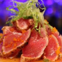 *Tuna Tataki · Lightly seared tuna on top of sliced cucumber. Served with smelt roe, green onion and  ponzu...