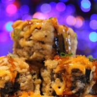  Aryana Roll (Fried) · Spicy craw fish, avocado and cream cheese, with crispy tempura outside, topped with spicy ma...