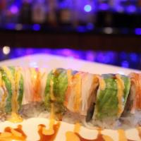 Lobster King Roll · Lobster tempura topped with crabstick and avocado, garnished with spicy mayo and eel sauce.