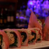Pink Lady Roll · Salmon tempura, crabstick, spring mix, snow crab and avocado in soy wrap.