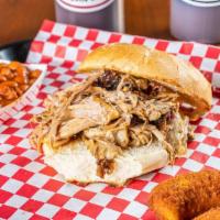 Pulled Pork Bbq · Sandwich with one side and hushpuppies.