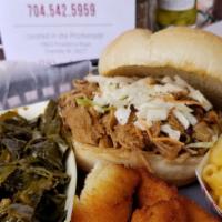Pulled Pork Bbq · Plate with two sides and hushpuppies.