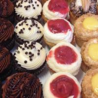 4 Pack · 12 flavors to choose! Our 100% scratch-made jumbo cupcakes are individually cupped for conve...