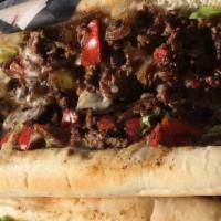 Steak Philly · Shaved sirloin grilled with green peppers, onions and white American cheese.