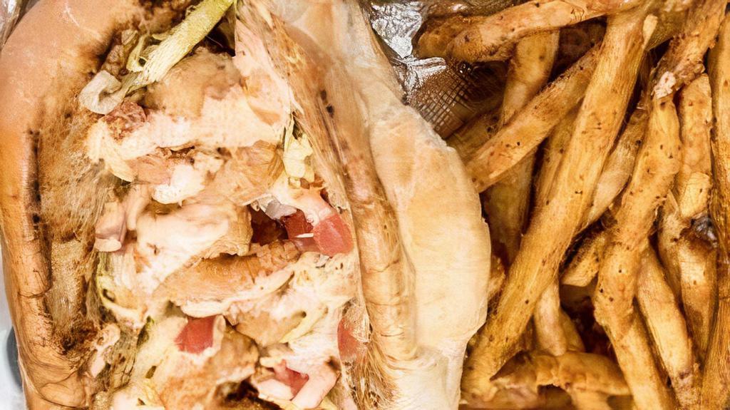 Stracey’S Shrimp Po Boy Sandwich · Fried shrimp, lettuce, tomato, and remoulade sauce on a hoagie roll.